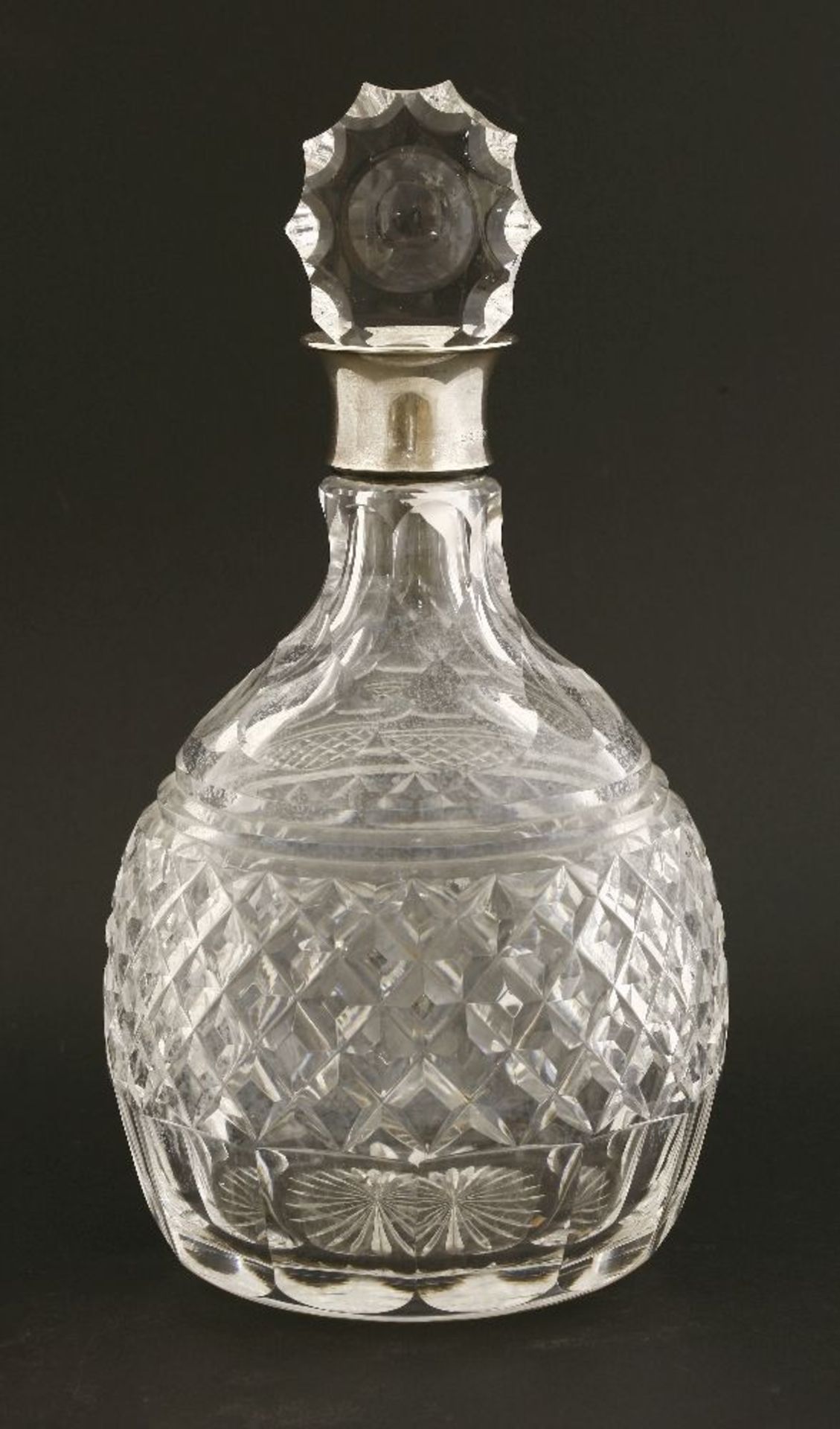 A large silver decanter,London, 1988,with a heavy glass body,32.5cm high
