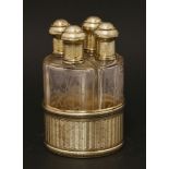 A late 19th/early 20th century French silver gilt perfume bottle stand,maker's mark obscured,of