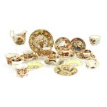 A collection of porcelain tea cups, coffee cans and saucers,early 19th century, anda tea plate,in