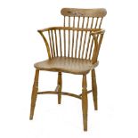 A yew wood, elm and possibly ash low back Windsor chair,19th century, with a bar back and