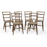 A set of six elm-seated kitchen chairs,19th century, each with a turned fruitwood top rail,39cm