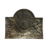 A very large cast iron fireback, with an arched top with the royal coat of arms, 102cm wide81cm