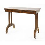 A coromandel(?) card table, 19th century, with patent action, the top opening and swivelling, the