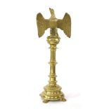 A church lectern, late 19th century, the eagle surmount with a bookrest, raised on a brass column,