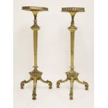 A pair of Chippendale-style carved limewood and purple heart gilt torchères,early 19th century,