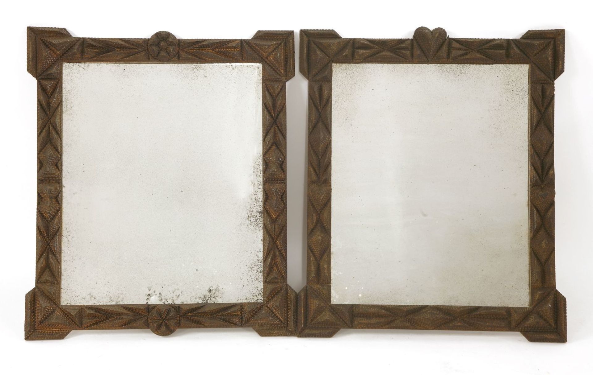 A pair of French carved and stained tramp art mirrors,late 19th century/early 20th century, each
