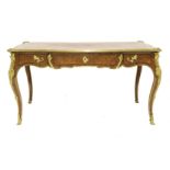 A kingwood and ormolu-mounted bureau plat,18th century, the red leather inset over a shaped front,