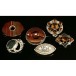 Six assorted Scottish silver brooches,to include:a silver banded agate circular brooch with rotating