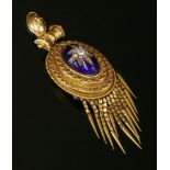 A Victorian diamond and enamel Etruscan Revival gold pendant, c.1870,with an oval boss to the