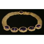 A gold cased Georgian amethyst and gold cannetille necklace, c.1820,a centrepiece composed of five