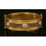 A cased Archaeological Revival gold micromosaic bangle, c.1870,of flat section oval form.