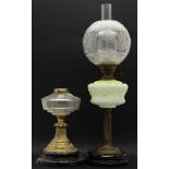 A Victorian oil lamp, with an opaline glass reservoir and acid etched shade, along with a