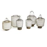 Six Chinese plied wire mesh garden lanterns, late 19th/early 20th century, the cages covered with