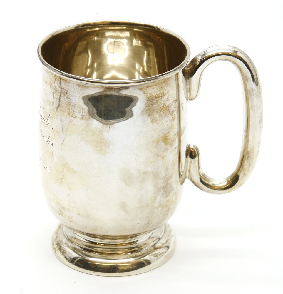 A silver tankard, Emile Viner, 1953, bears engraving to front, 13cm high