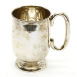 A silver tankard, Emile Viner, 1953, bears engraving to front, 13cm high