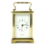 A Bayard brass carriage clock, the white dial with black roman numerals, 18cm high