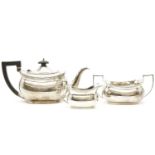 A three piece silver tea set, Birmingham 1928, makers mark B B S LD, approximately 43oz