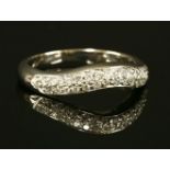 A platinum diamond set Bulgari 'Corona' curved band ring,a polished quartz section band ring with