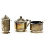 An Art Deco silver three piece cruet by Edward Barnard & Sons, comprising of a salt, pepper and