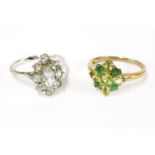 A 9ct gold peridot and emerald cluster ring, claw set to a plain polished shank, size M, a 9ct white