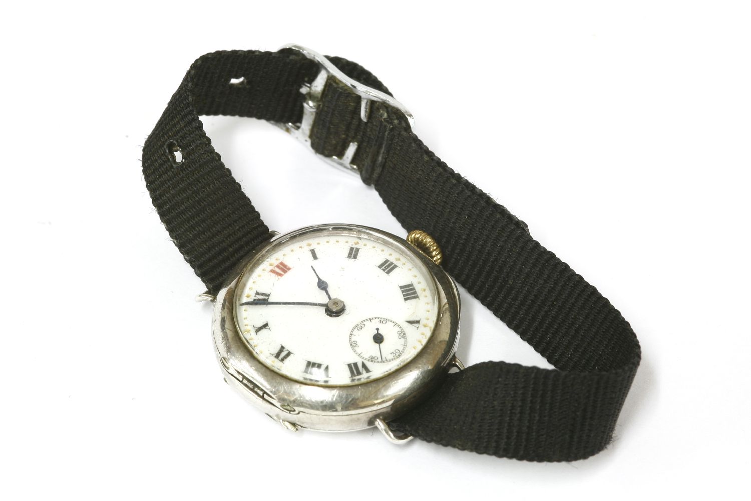 A ladies silver cased wristwatch, on a black fabric strap, back engraved 'Dorothy F Taylor 1924'