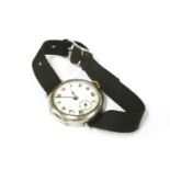 A ladies silver cased wristwatch, on a black fabric strap, back engraved 'Dorothy F Taylor 1924'