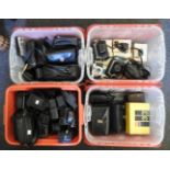 A quantity of vintage and novelty cameras, together with a collection of photography equipment, to