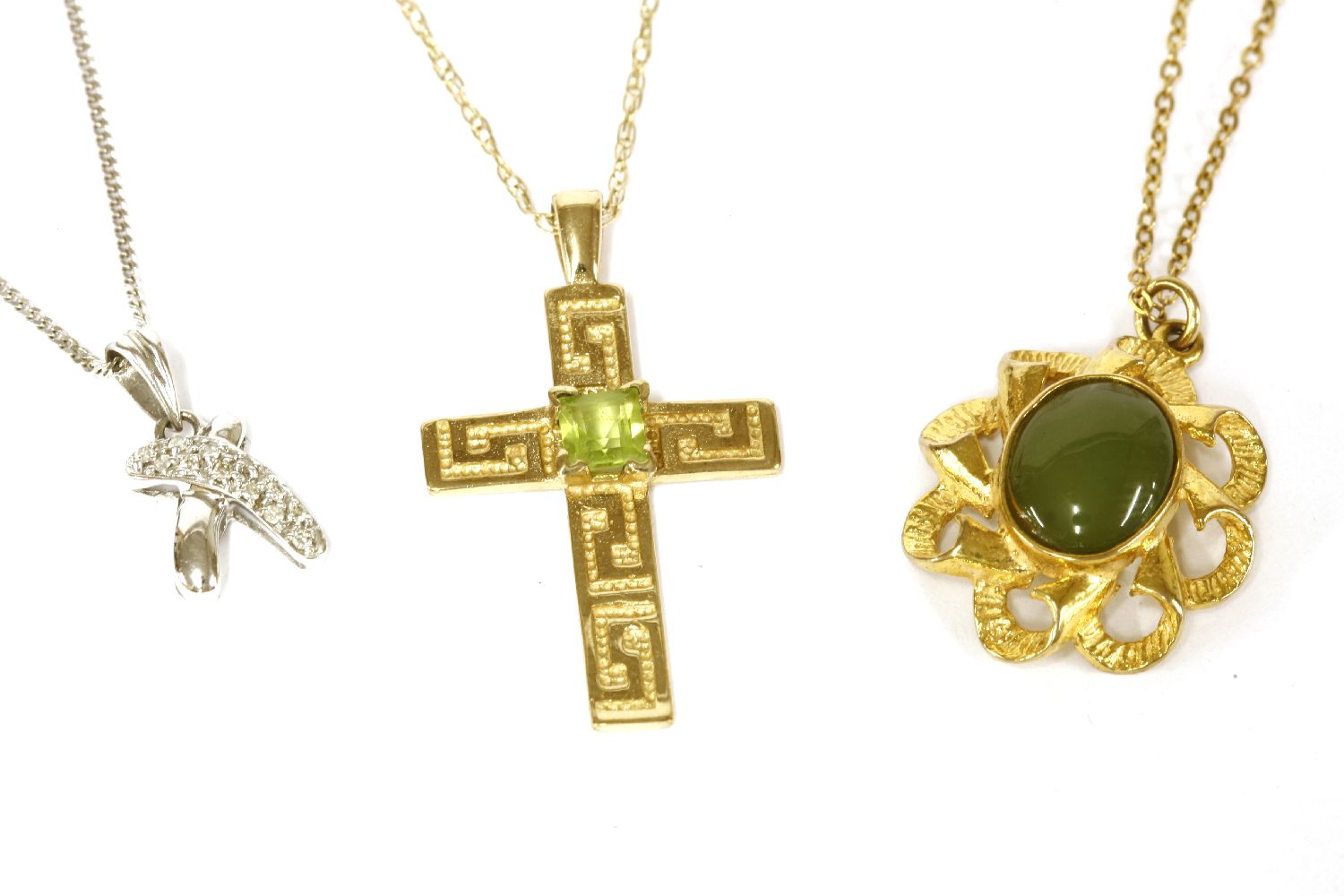 A white gold diamond set cross over pendant on chain, a 9ct gold cross with Greek key decoration and