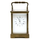 A French brass carriage clock, by L'Epie