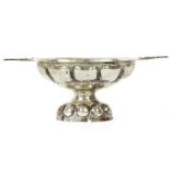 A Continental silver bowl, of oval form with pierced handles on a low foot, 22cm wide