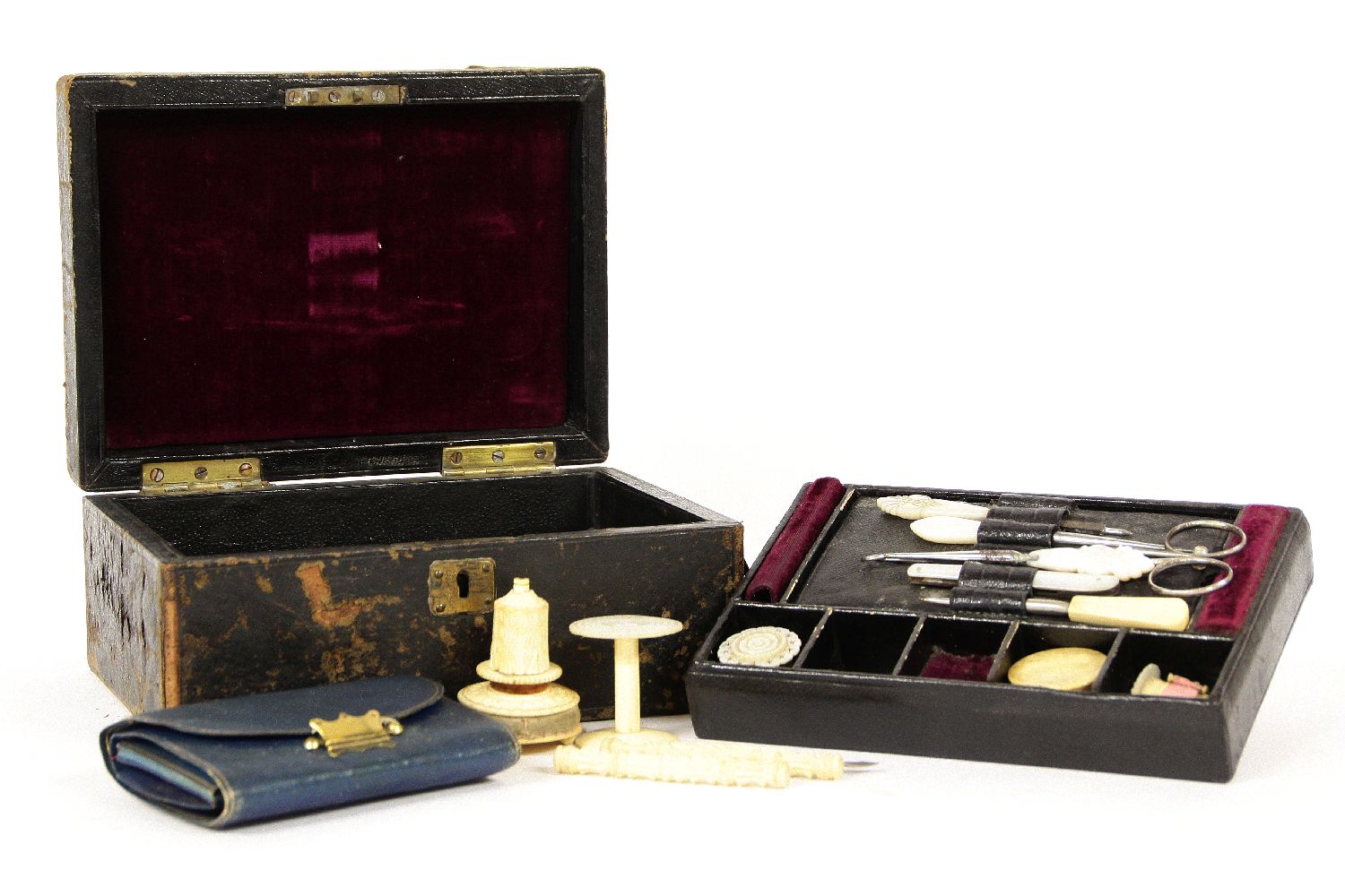 A 19th century sewing box, with a number of bone tools