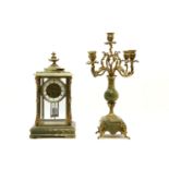 A late 19th century French four glass mantel clock with onyx base and mercury pendulum, by Henri