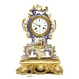 A late 19th century French gilt and porcelain mantel clock (a/f), 32cm high