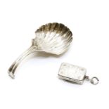 A Georgian silver shell caddy spoon, by Henry Tudor & Thomas Leader, Sheffield, 1791 (?), and a