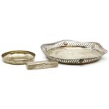 A pierced silver dish, a small circular silver dish, and a white metal rectangular case stamped 84
