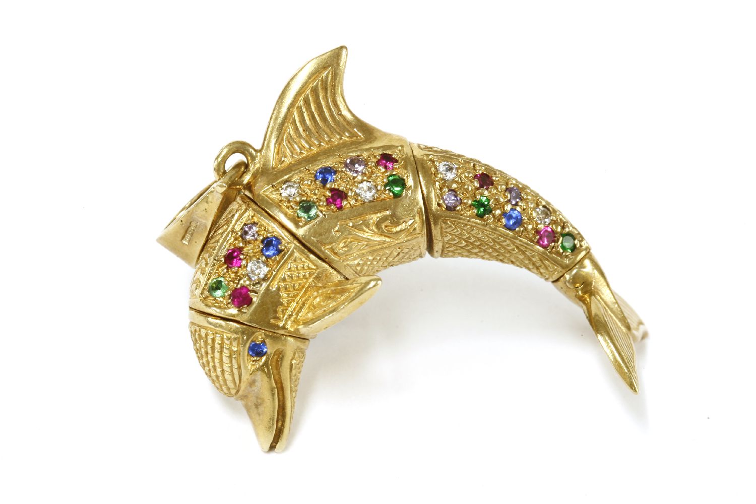 A 9ct gold articulated dolphin pendant, set with multi-coloured cubic zirconia and synthetic