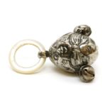 An Edwardian silver 'Humpty Dumpty' rattle, stamped L.S, with teething ring, Birmingham, 1909