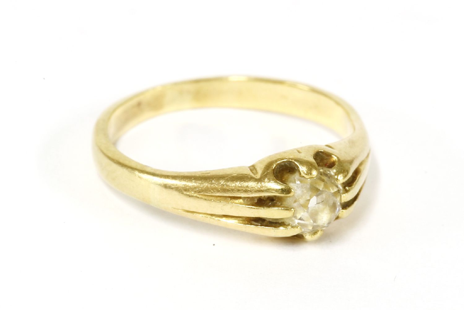 A gold single stone old European cut diamond ring, (tested as approximately 18ct gold) c.19002.88g