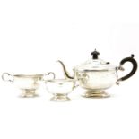 A silver three piece teaset, Birmingham 1931