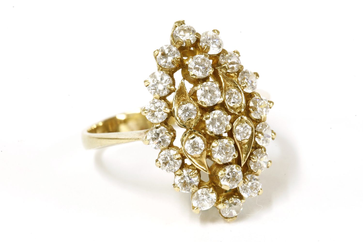 A gold diamond simulant lozenge shaped cluster ring, (tested as approximately 14ct gold), size P½4.