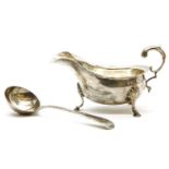 An Edwardian silver sauce boat, possibly by John Batt, Sheffield, 1902, together with a sauce boat