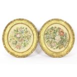 A pair of oval embroidered floral panels, in gilt frames, 25cm high x 28cm wide, together with two