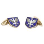 A pair of 9ct gold cufflinks, with enamel eagle decoration