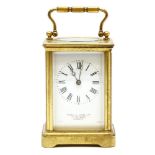 Howell & James Ltd, London, brass carriage clock, white enamel dial with black Roman numerals