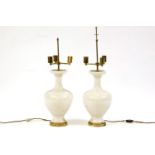 A pair of modern table lamps, of baluster form and with a white glaze in a craquelure finish, 45cm
