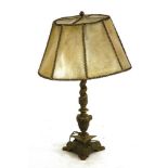 A heavy brass table lamp and shade with triform base, 86cm high