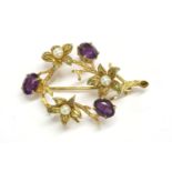 A 9ct gold amethyst and cultured pearl spray circle brooch, by Cropp and Farr, a circular branch