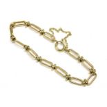 A 9ct gold fetter and knot bracelet, with bolt ring clasp and safety chain, 10.54g