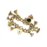 A 9ct gold curb link charm bracelet with padlock, and ten assorted Georgian, William VI and