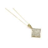 A 9ct gold diamond pavé cluster pendant, on a gold trace chain, 2.03g